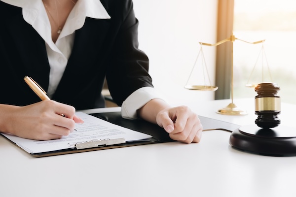 Lawyer concept, Legal professions with legal devices gavel and lawyer brand on desk in office.